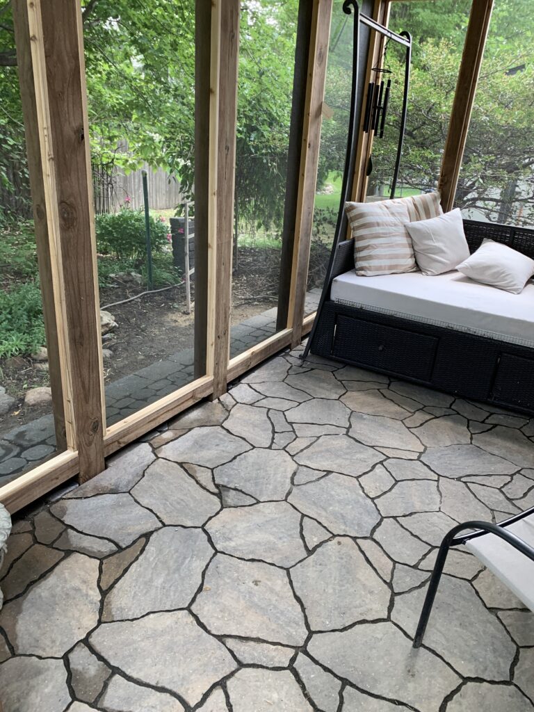 Custom 3-season porch addition with floor-to-ceiling windows and cedar interior finishes in Tea, SD.