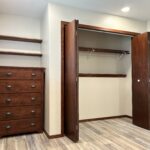 Custom master bedroom renovation featuring high-end finishes, modern lighting, and professional interior carpentry in Sioux Falls, SD.