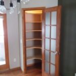 Custom residential walk-in closet organization and handcrafted wood shelving systems in Sioux Falls, SD.