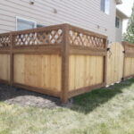 Custom residential wood fence installation featuring premium cedar privacy fencing and professional craftsmanship.