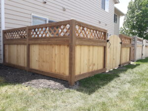 Custom residential wood fence installation featuring premium cedar privacy fencing and professional craftsmanship.