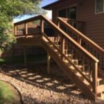 Professional residential deck repair, structural post replacement, and wood rot restoration in Lennox, SD.