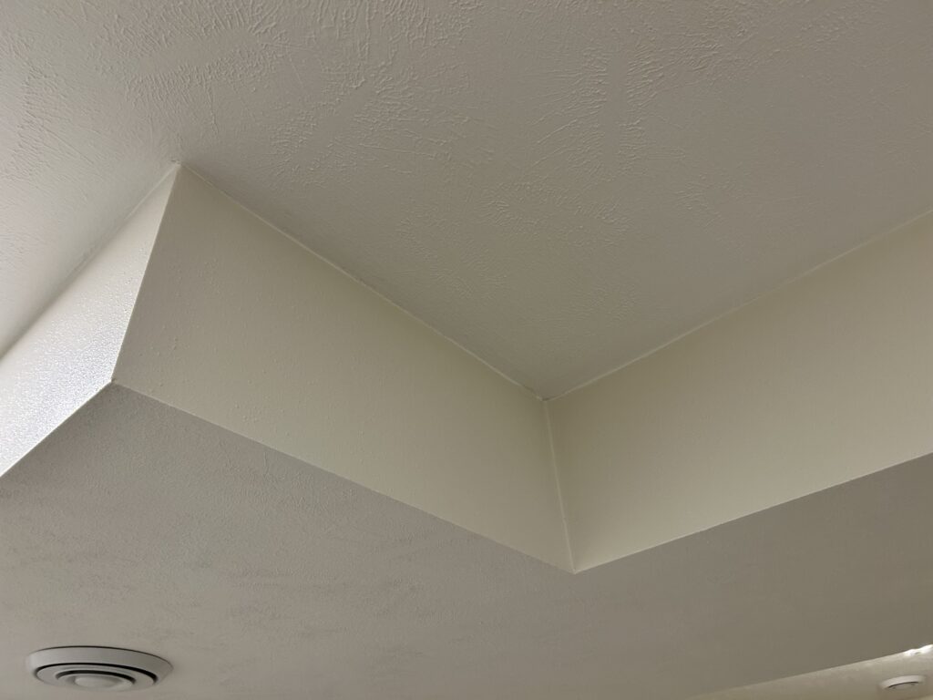 Seamless drywall ceiling finishing and professional mudding for a residential renovation in Sioux Falls, SD.