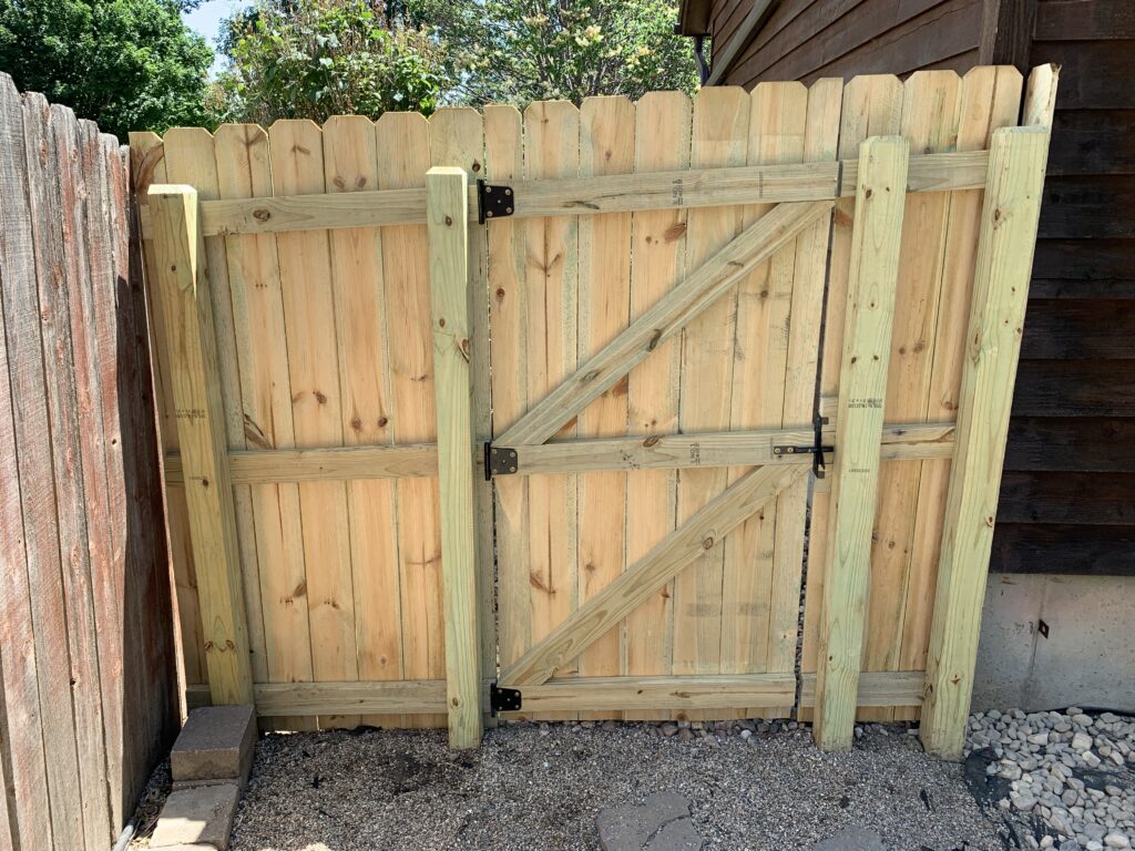 Custom wood gate repair and professional fence gate installation by a licensed general contractor in Canton, SD.