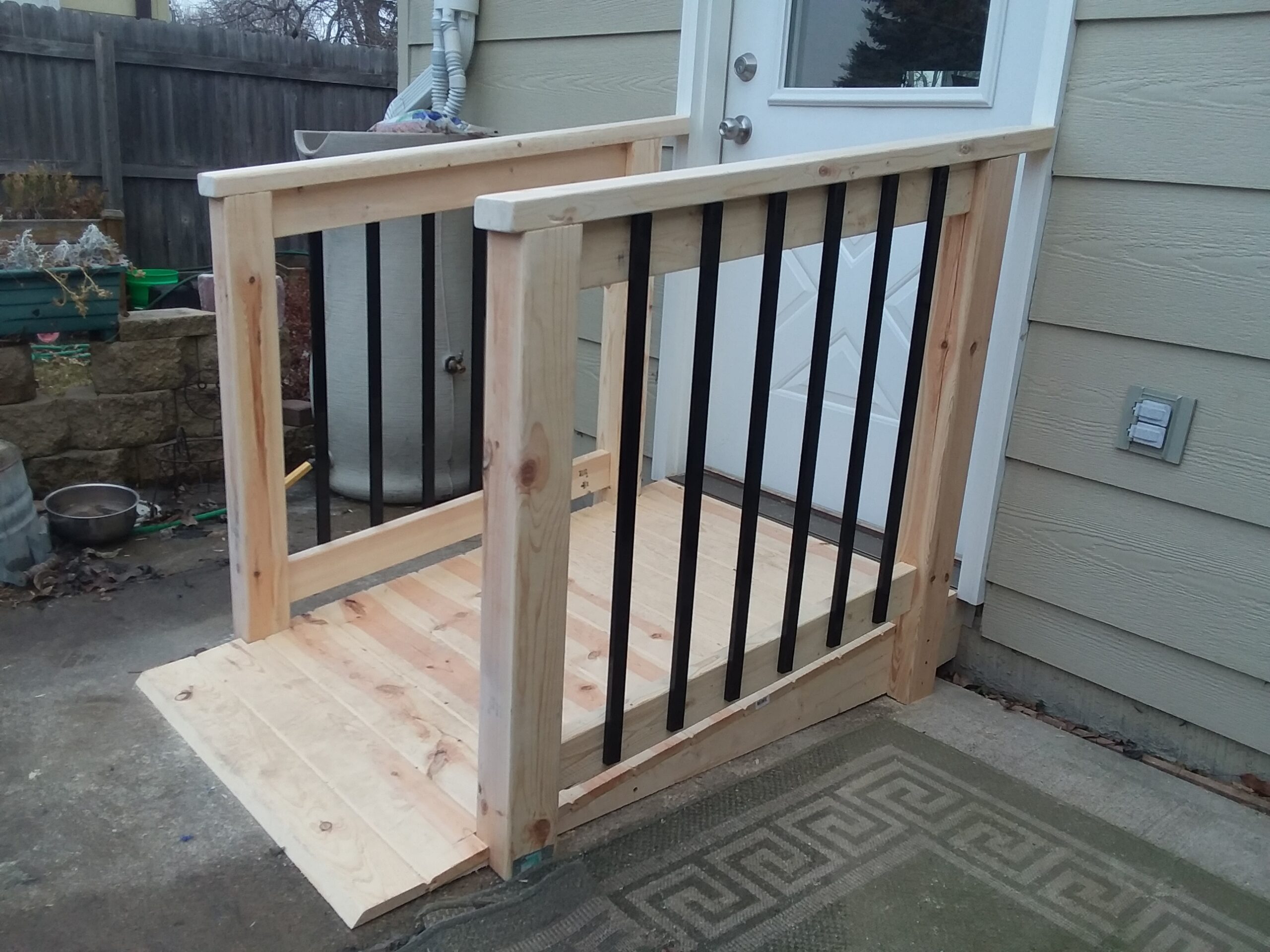 Custom wooden handicap ramp construction and home accessibility services in Harrisburg, SD.