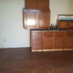 Modern kitchen remodel featuring custom cabinetry, countertops, and flooring in Sioux Falls, SD.