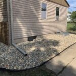 Custom residential landscaping and backyard patio design for a home in Hartford, SD.