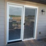 Energy-efficient sliding patio door replacement and professional exterior door installation for a residential home in Sioux Falls, SD.