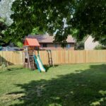 Custom 6-foot wood privacy fence installation and residential backyard fencing by a local contractor in Sioux Falls, SD.