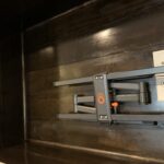 Professional TV wall mounting, hidden wire management, and home theater setup services by a local handyman in Sioux Falls, SD.