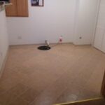 Professional ceramic and porcelain tile floor installation and grout repair by a local handyman in Hartford, SD.