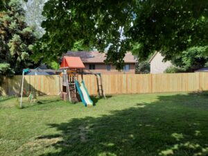 Professional wood privacy fence installation and residential backyard fencing by a local contractor in Brandon, SD.