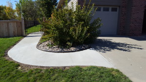 Professional concrete sidewalk repair and crack sealing by a local handyman in Brandon, SD.