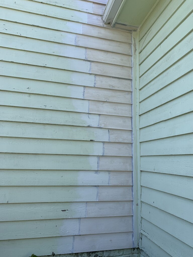 Professional cedar siding repair, storm damage restoration, and exterior panel replacement by a local handyman in Harrisburg, SD.